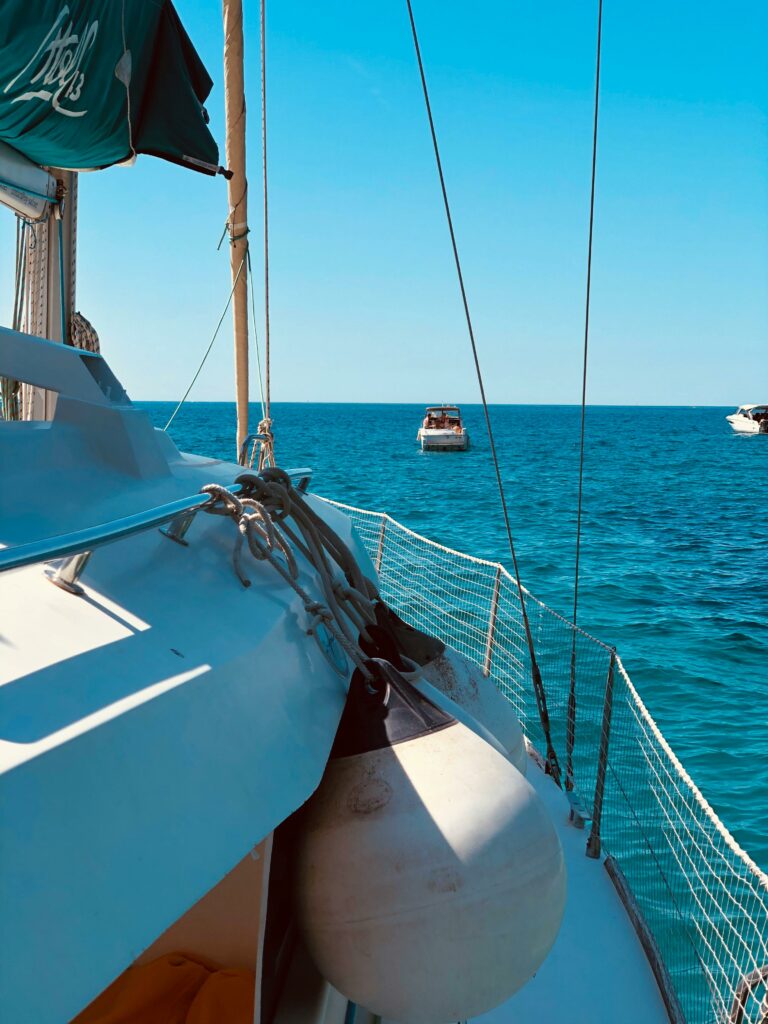 pexels-photo-8098947-8098947 A serene scene of a sailboat on the blue waters of Provence-Alpes-Côte d'Azur, France.